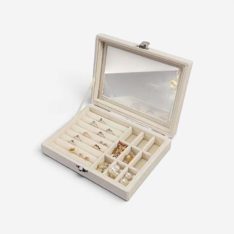 Boîte à bijoux beige avec vitrine transparente et rangement compartimenté.