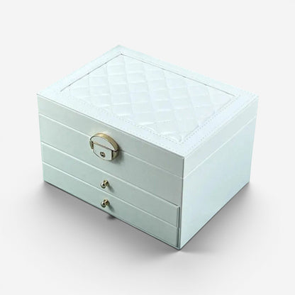 Boîte à bijoux blanche avec tiroirs et compartiments pour organiser les accessoires.