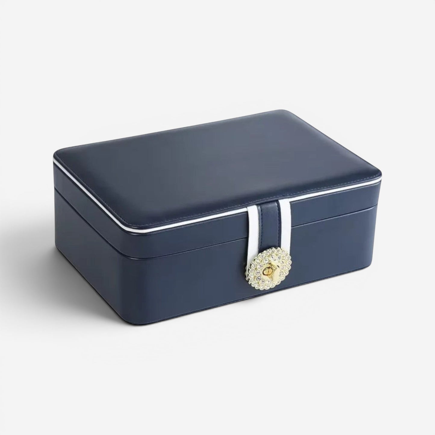 Boîte à bijoux bleue, fermée avec design élégant et grande capacité de rangement.