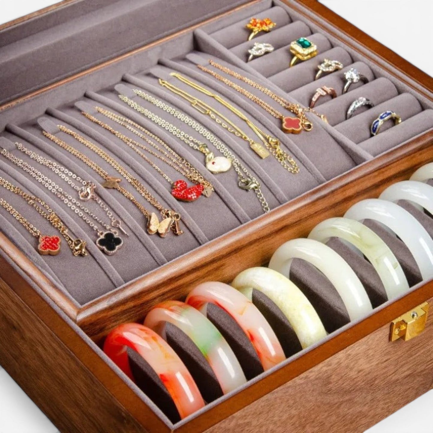 Boîte à bijoux en bois authentique avec support pour bagues, offrant un rangement pratique et sécurisé.