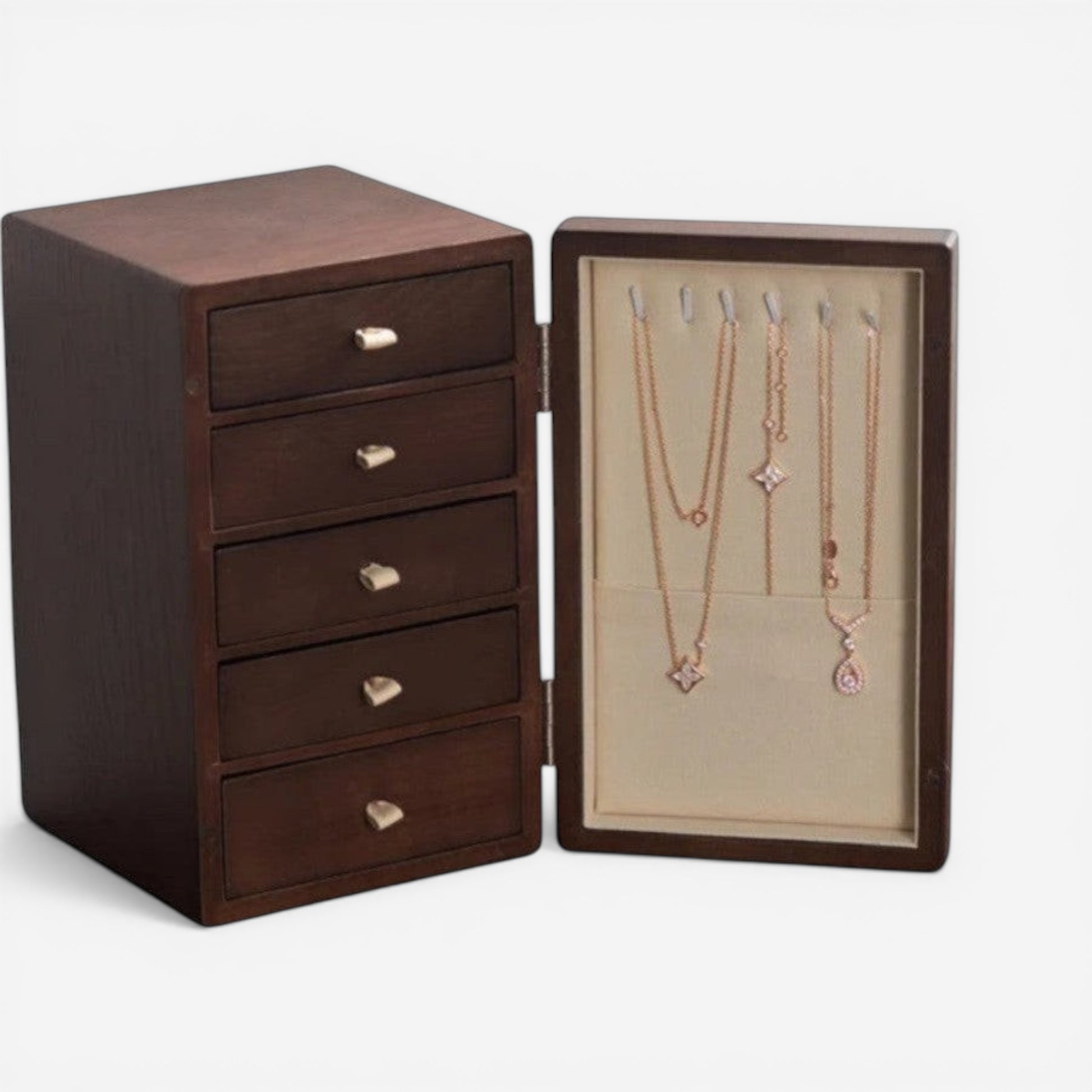 Boîte à bijoux en bois avec espace pour suspendre colliers et tiroirs de rangement.