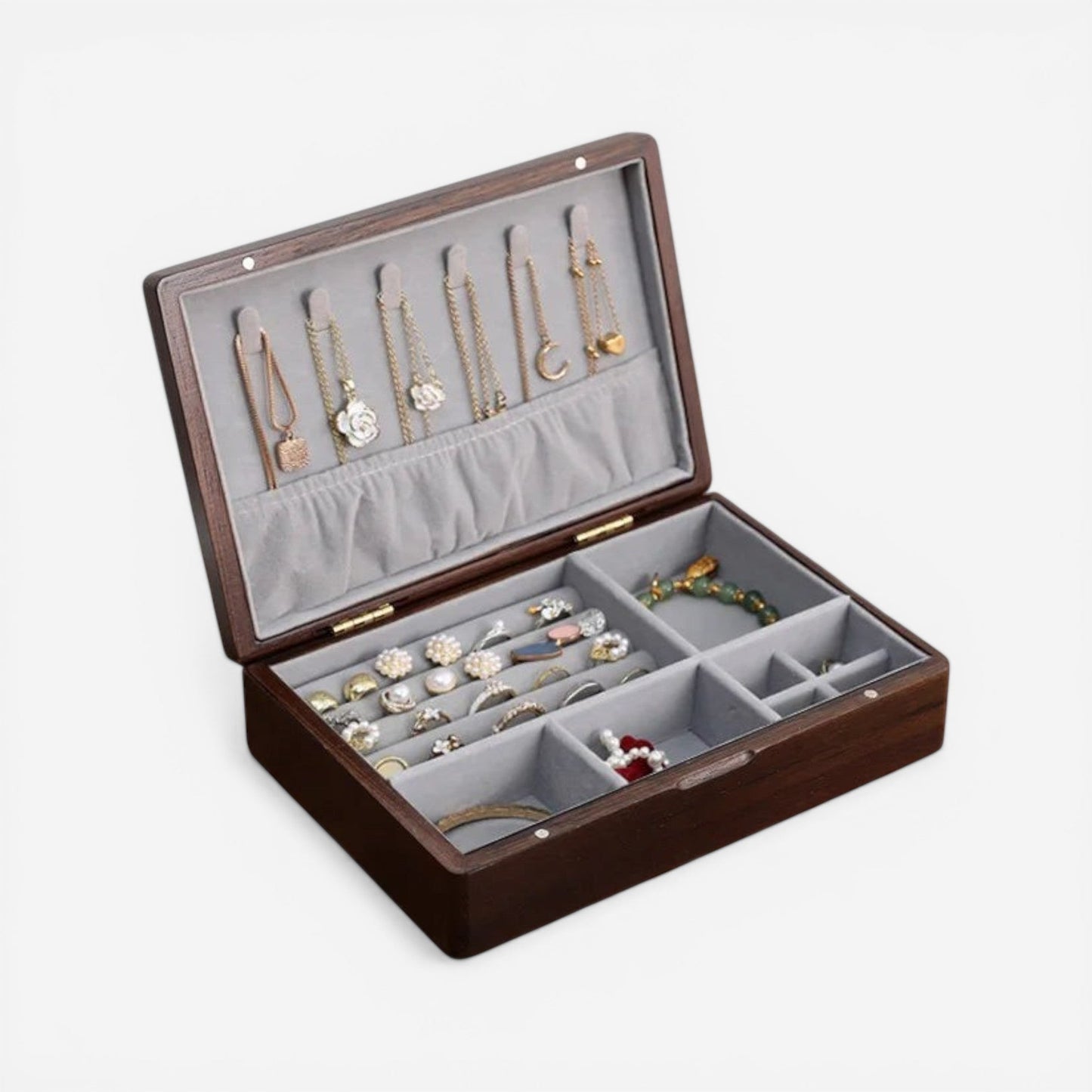 Boîte à bijoux en bois raffiné avec intérieur en velours pour protéger et sublimer vos bijoux précieux.