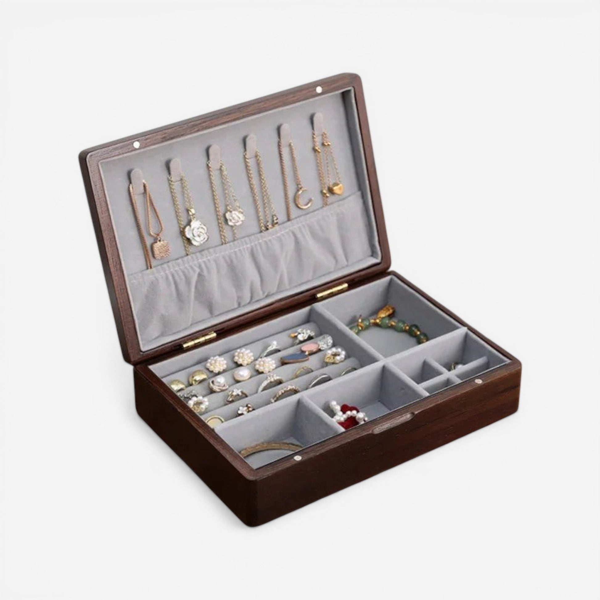 Boîte à bijoux en bois raffiné avec intérieur en velours pour protéger et sublimer vos bijoux précieux.