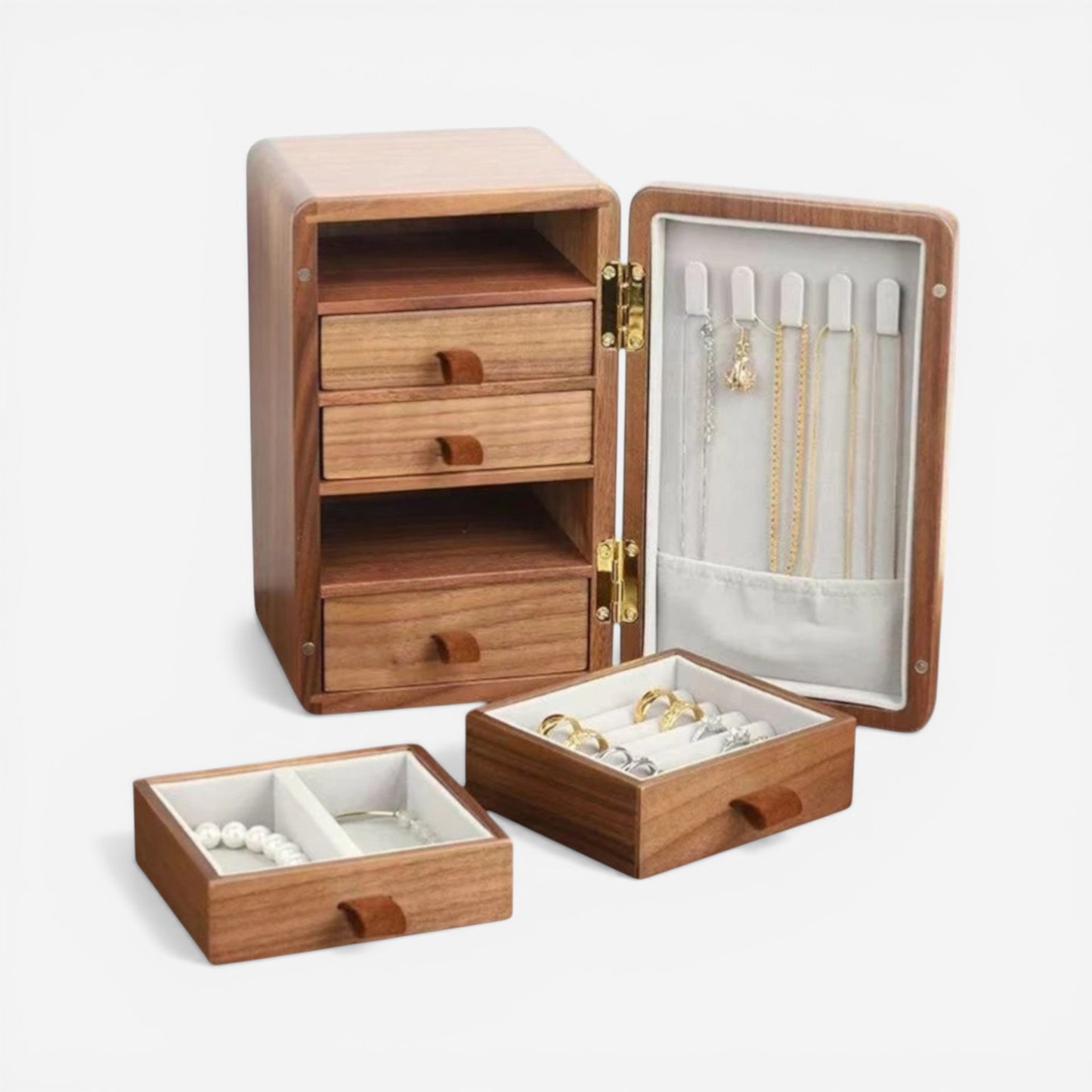 Boîte à bijoux en bois avec tiroirs amovibles et compartiments pour bagues, colliers et bracelets.