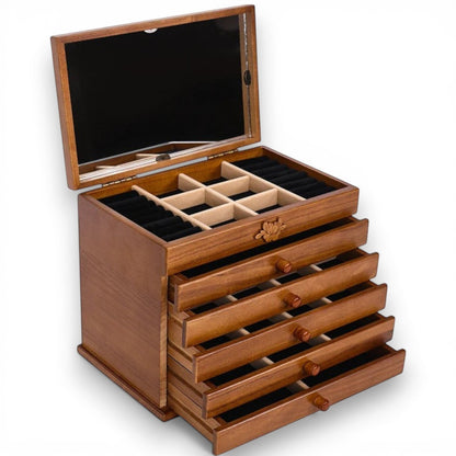 Boîte à bijoux en bois avec tiroirs ouverts montrant les compartiments de rangement pour bijoux.