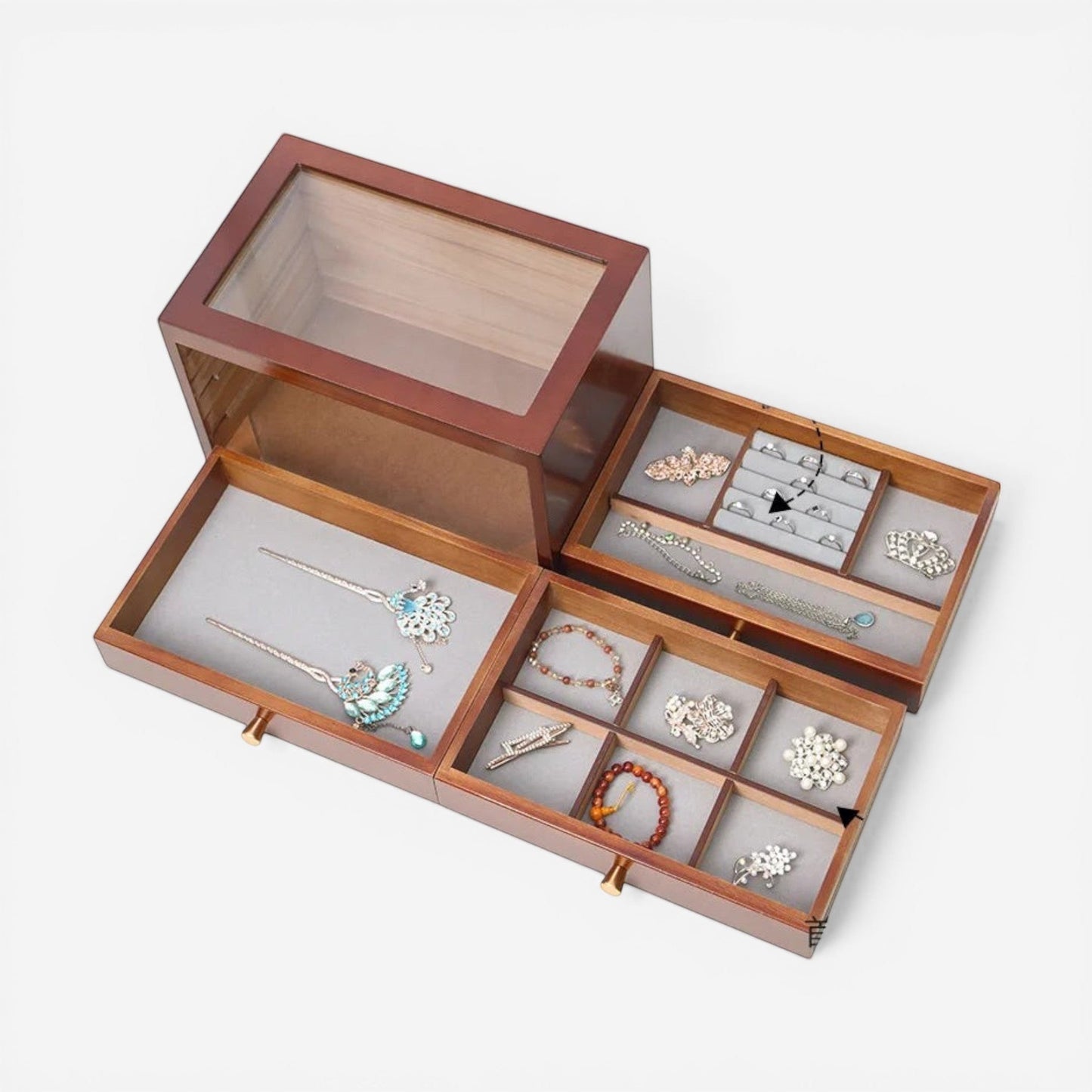 boîte à bijoux en bois avec plusieurs tiroirs ouverte montrant les compartiments de rangement