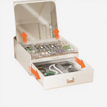 Boîte à bijoux avec miroir intégré et compartiments pratiques pour un rangement organisé et accessible.