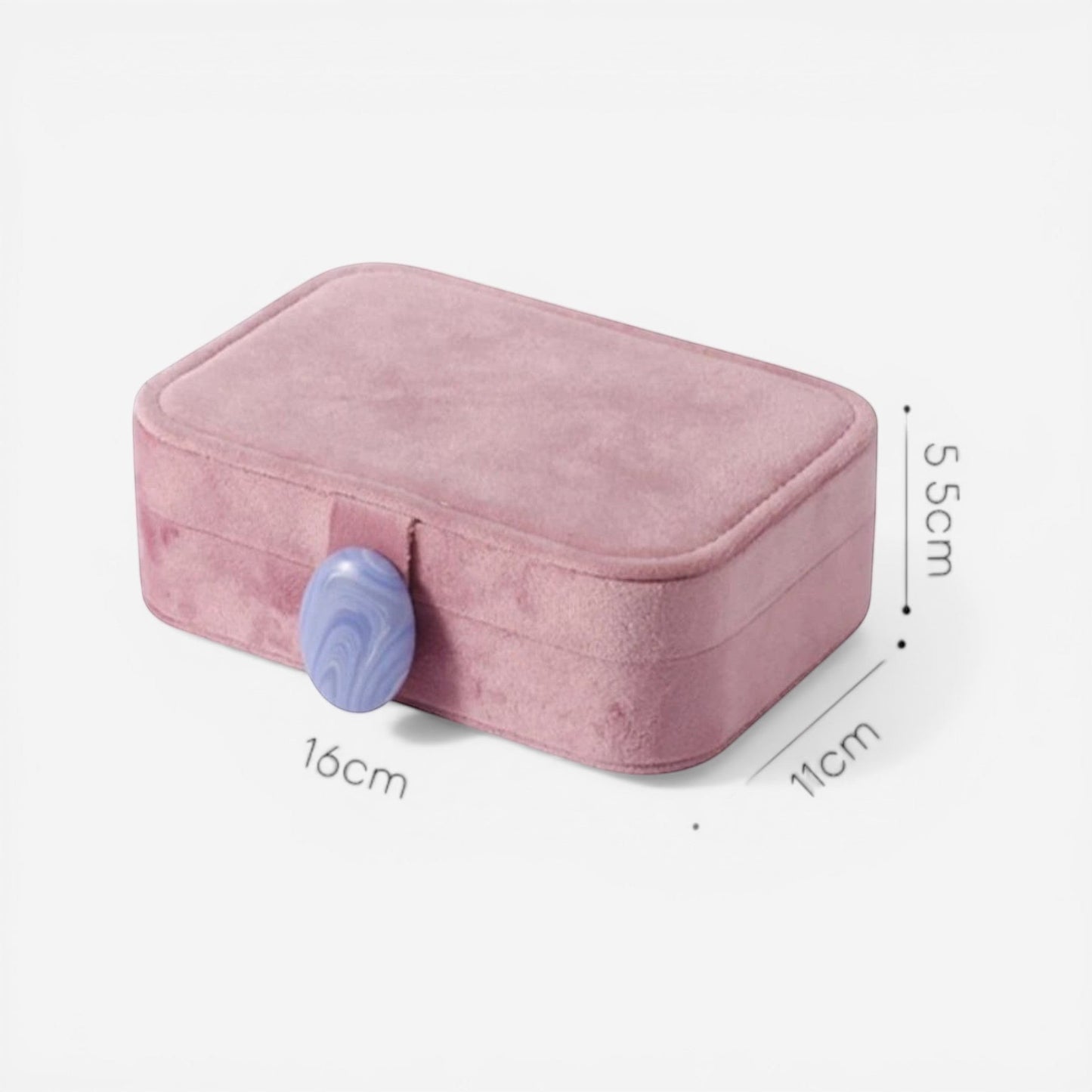 boîte à bijoux nomade rose fermée avec design élégant pour voyage