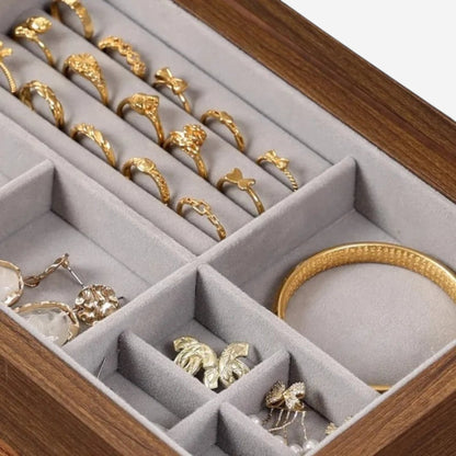 Boîte à bijoux rétro de luxe avec multiples compartiments pour un rangement organisé et pratique.