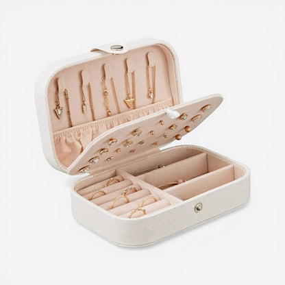 boîte à bijoux minimaliste en simili cuir avec boutons et rangement optimisé