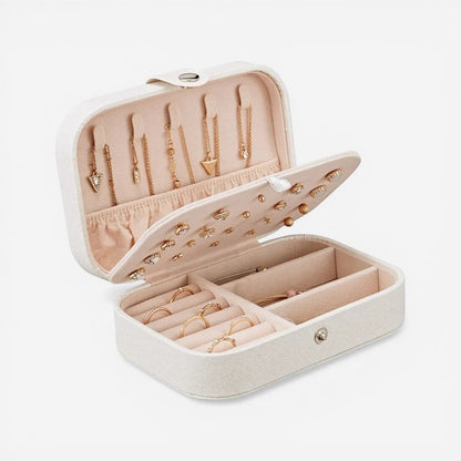 Boîte à bijoux en simili cuir à boutons