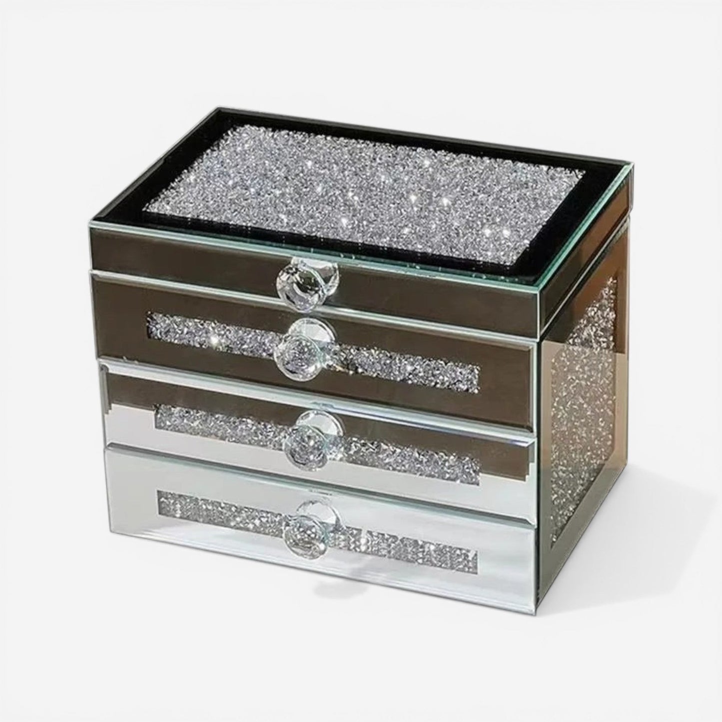 Boîte à bijoux strass compacte et brillante idéale pour un rangement chic et peu encombrant.