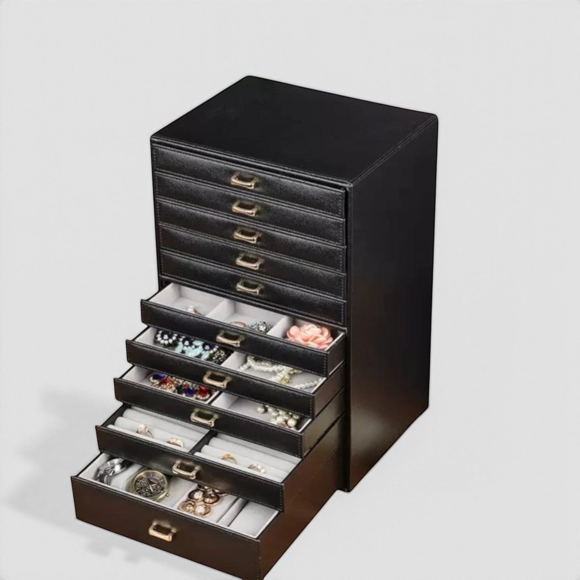 Boîte à bijoux noire grand format avec tiroirs multiples pour un rangement optimal.