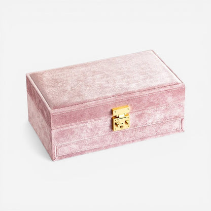 Boîte à bijoux en velours rose élégante avec compartiments internes pour un rangement raffiné.