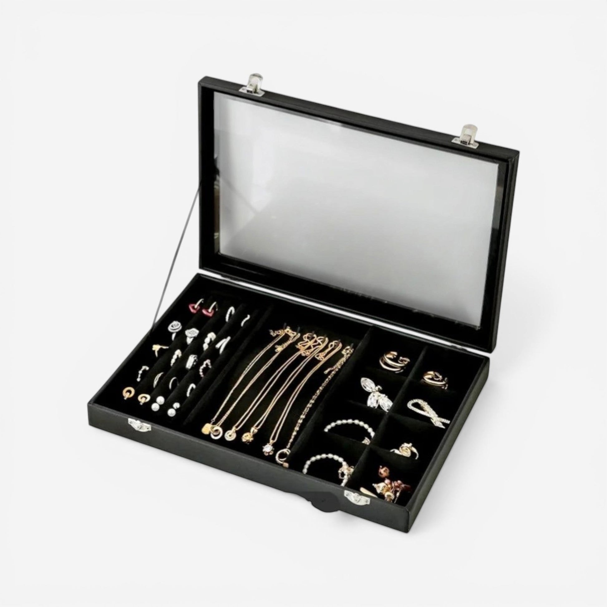 Boîte à bijoux avec vitre transparente et compartiments pour organiser bagues et accessoires.