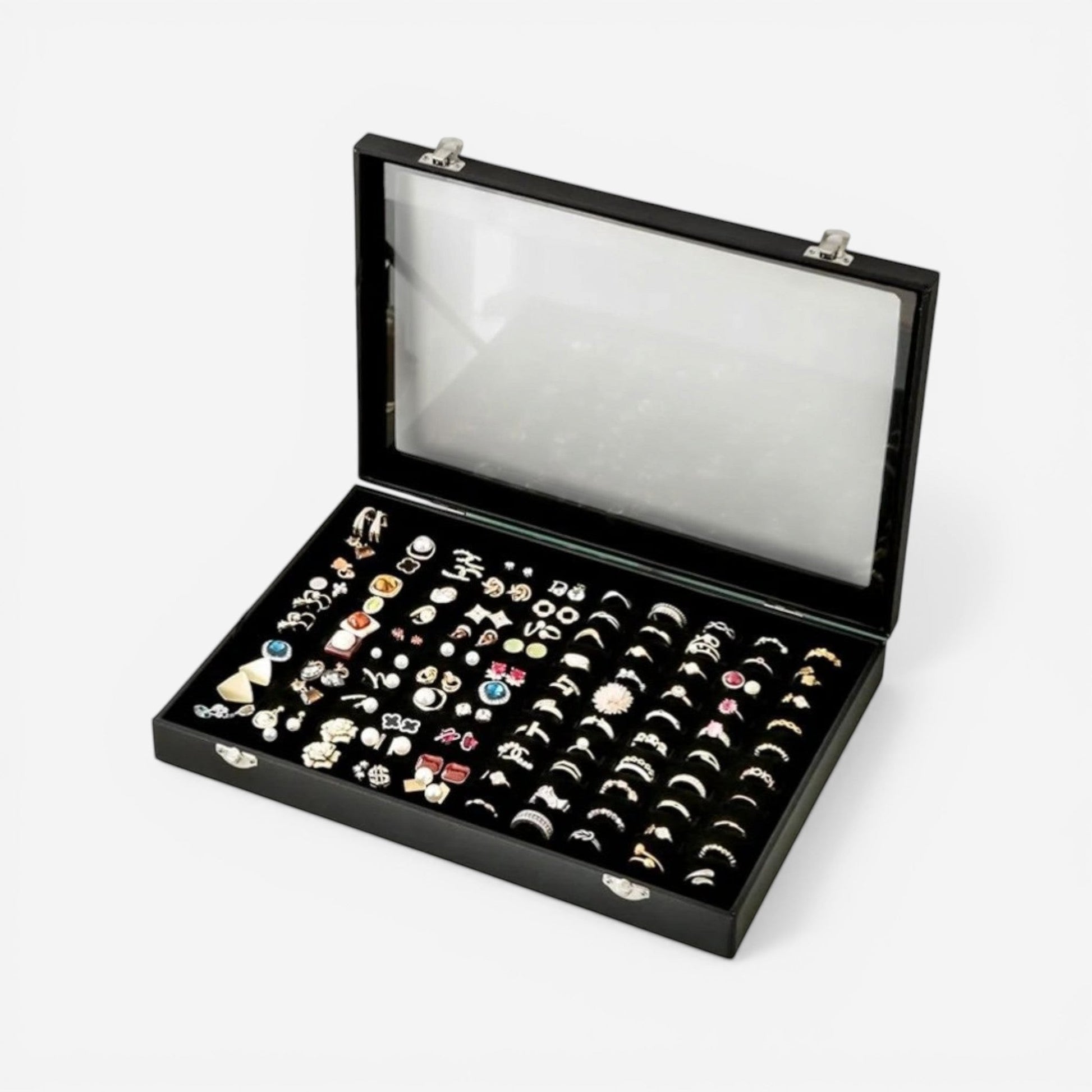 Boîte à bijoux avec vitre transparente ouverte, montrant les compartiments de rangement pour bagues.