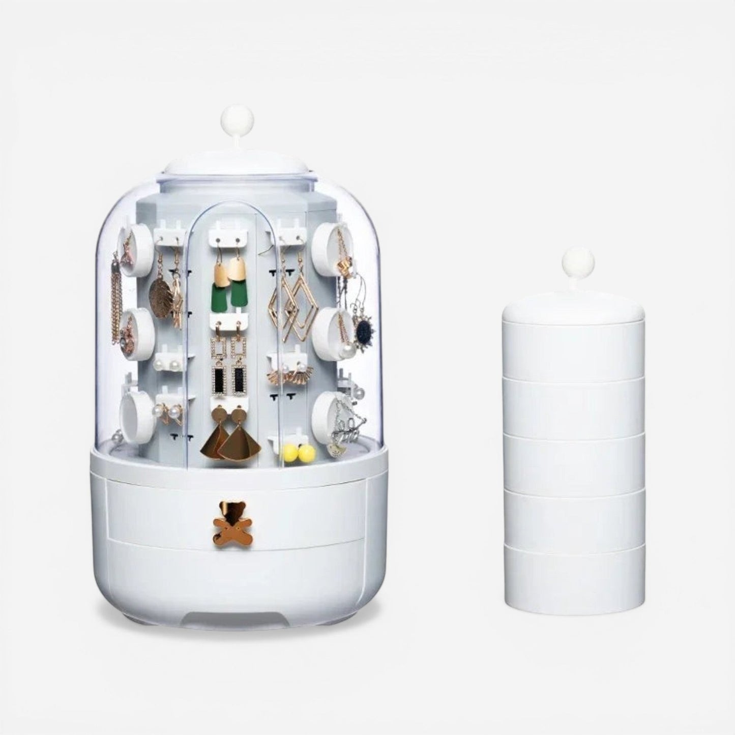 Organisateur de bijoux rotatif à 360 degrés blanc au design minimaliste, pratique pour accéder facilement à vos bijoux tout en gardant un espace ordonné.