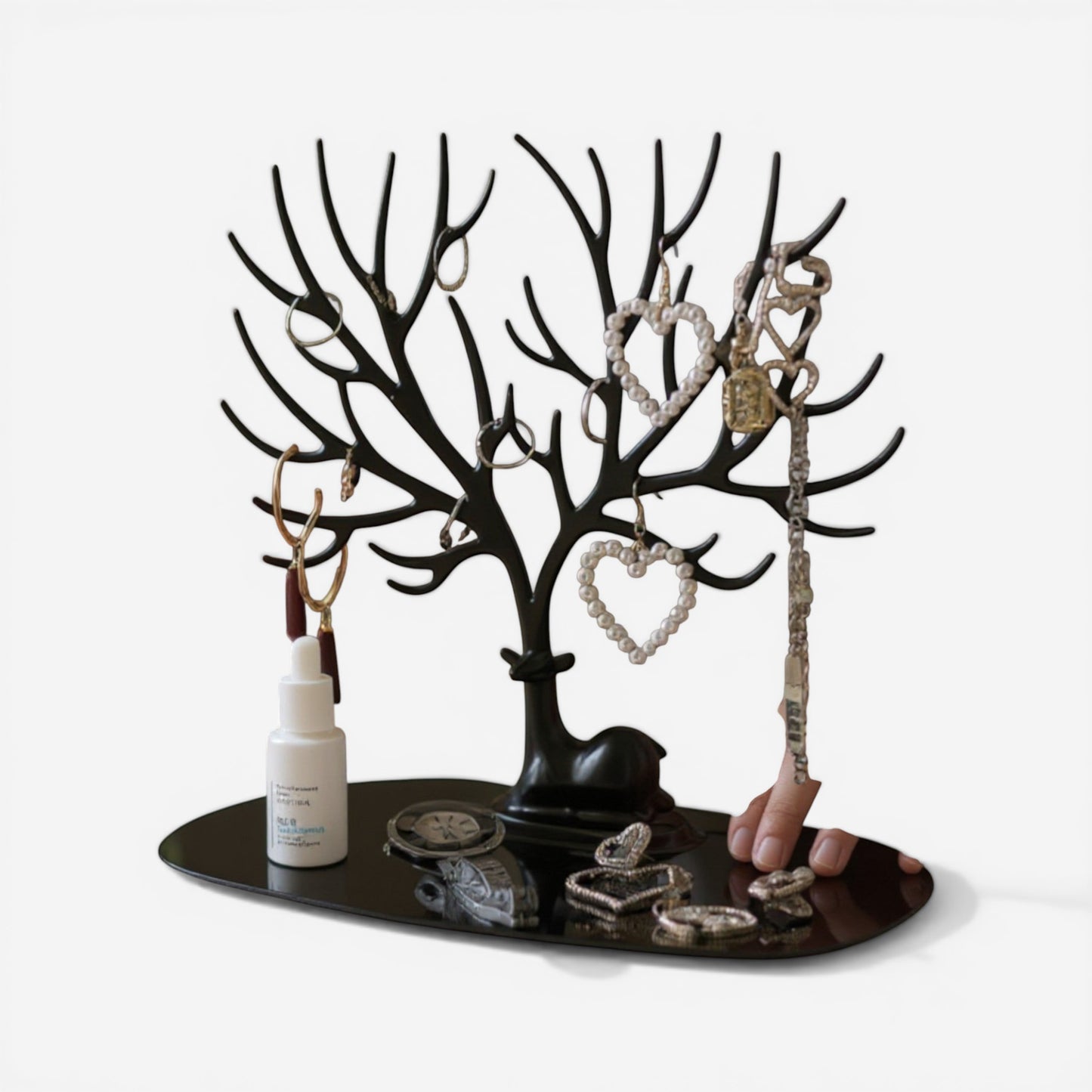Présentoir à bijoux arbre noir avec base pour accessoires et bijoux organisés.