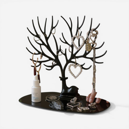 Présentoir à bijoux arbre noir avec base pour accessoires et bijoux organisés.