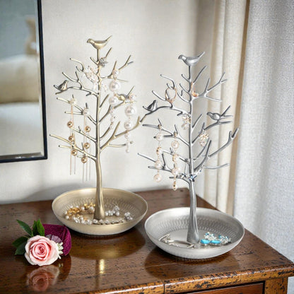 Présentoir à bijoux en alliage noir en forme d’arbre, avec supports pour boucles d’oreilles et accessoires.