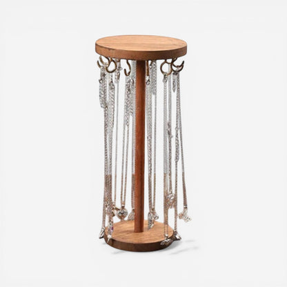 Présentoir à bijoux en bois couleur pêche avec 12 crochets pour organiser colliers et accessoires.