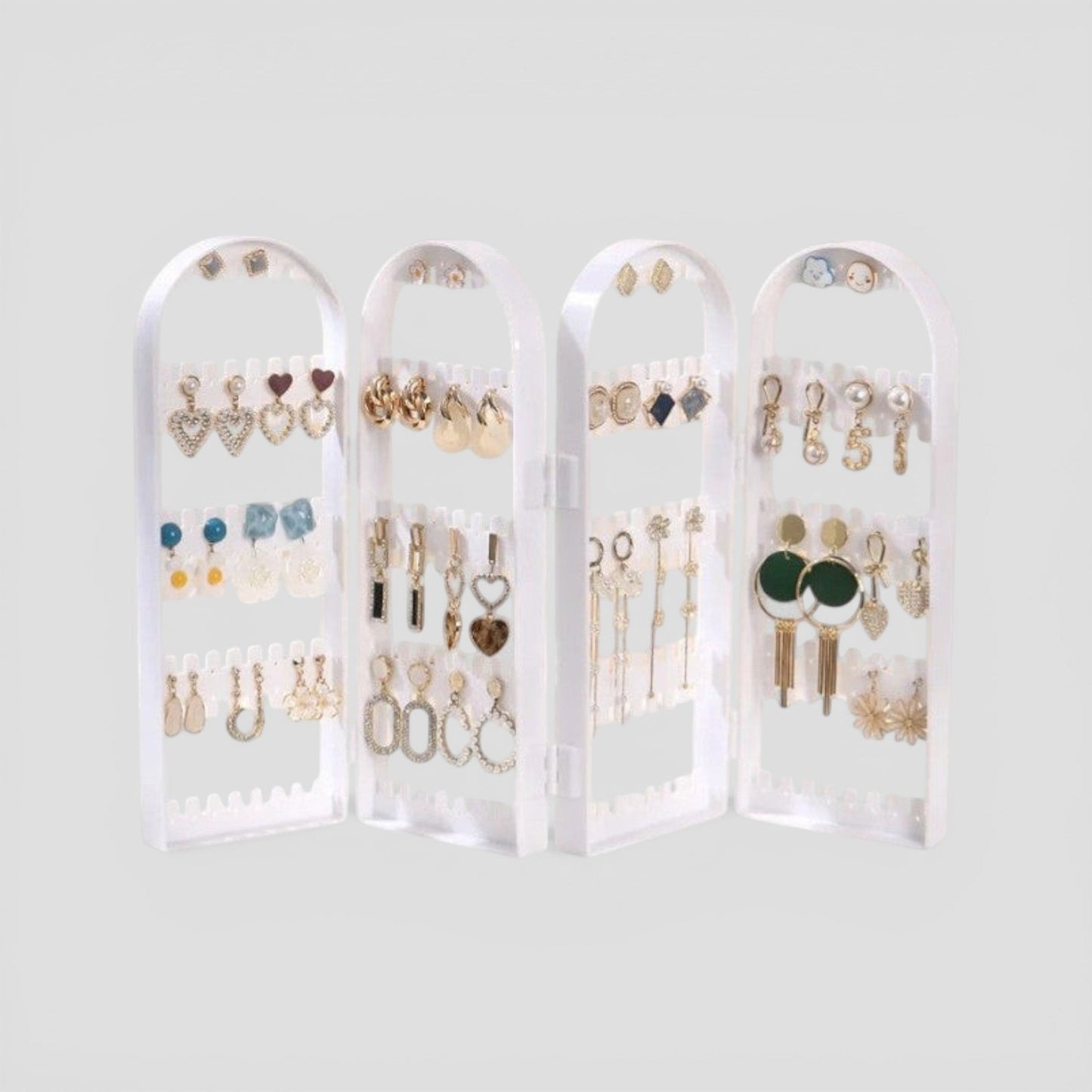 Présentoir à bijoux compact et pliable en acrylique, parfait pour le rangement des boucles d’oreilles.