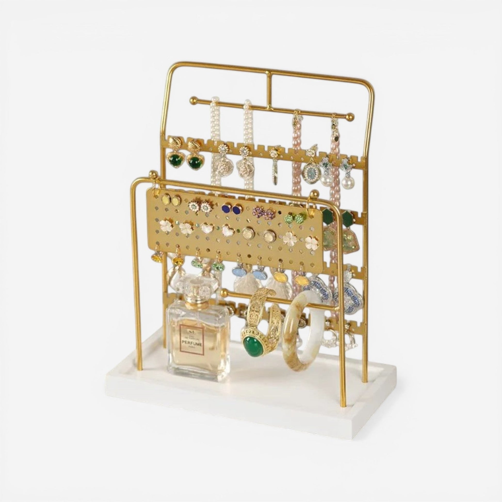 Présentoir à bijoux en métal doré élégant avec plusieurs supports pour organiser colliers, boucles d’oreilles et accessoires.