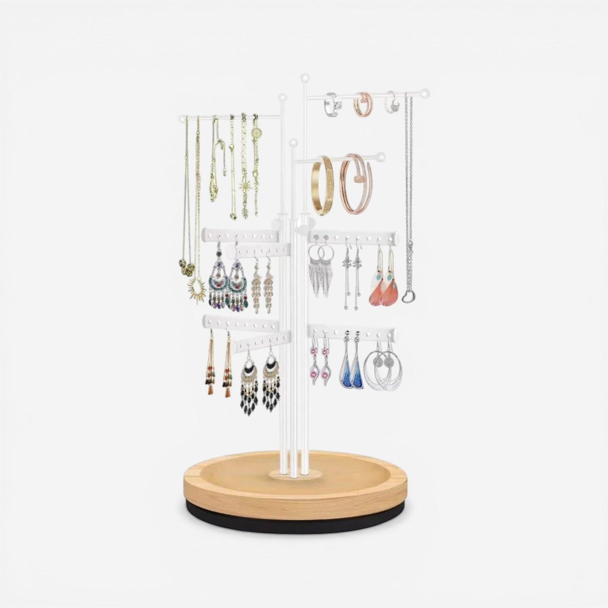 présentoir rotatif bijoux avec base en bois permettant une présentation élégante et accessible