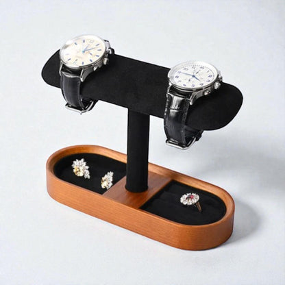 Présentoir pour montres noir avec support en coussin et base en bois, sans tiroir.